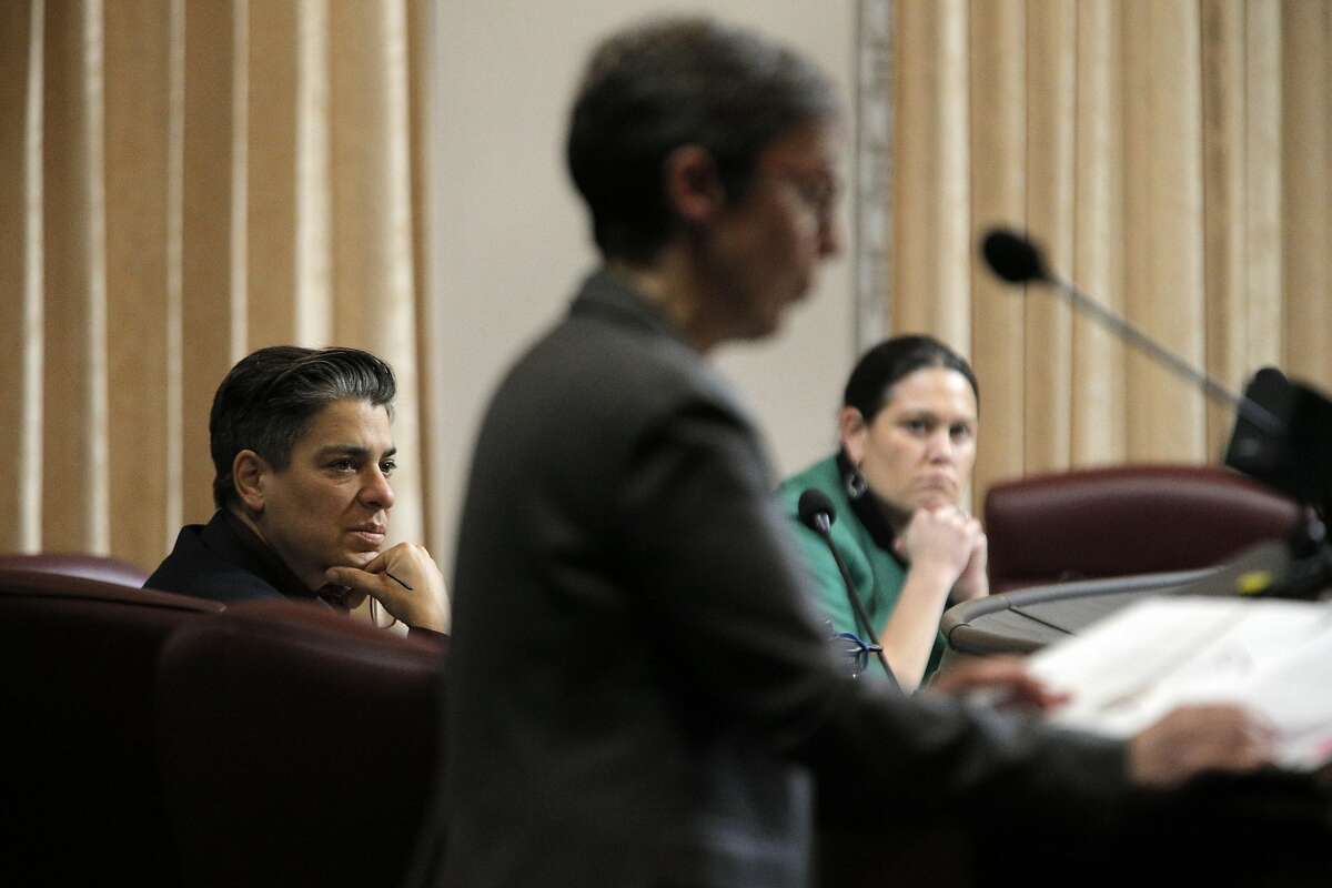 Supervisor Rebecca Kaplan, left, on the dais while council discussed city measures and resolutions related to the Ghost Ship fire during a city council meeting with several at City Hall in Oakland, Calif., on Monday, January 23, 2017.