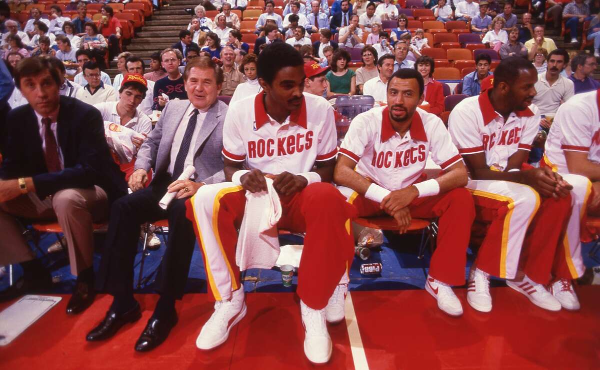 March 1987 - Houston Rockets asst coach Rudy Tomjanovich, head coach Bill Fitch, players in warmups: Ralph Sampson, Allen Leavell, Cedric Maxwell
