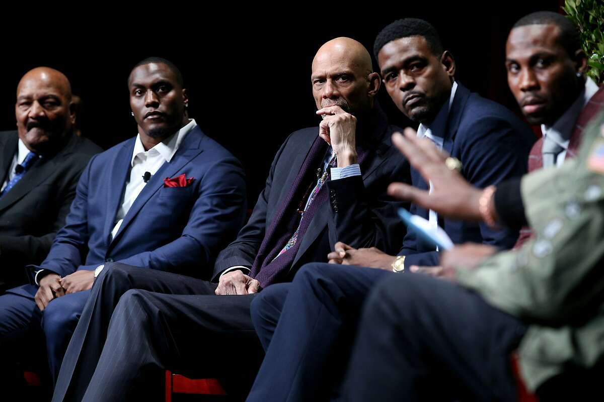 From left: Jim Brown, Takeo Spikes, Kareem Abdul-Jabbar, Chris Webber and Anquan Boldin listen in to Harry Edwards (not pictured) during the "From Protest to Progress: Next Steps" panel in San Jose State University's Institute for the Study of Sport, Society and Social Change, on Tuesday, Jan. 24, 2017 in San Jose, Calif.