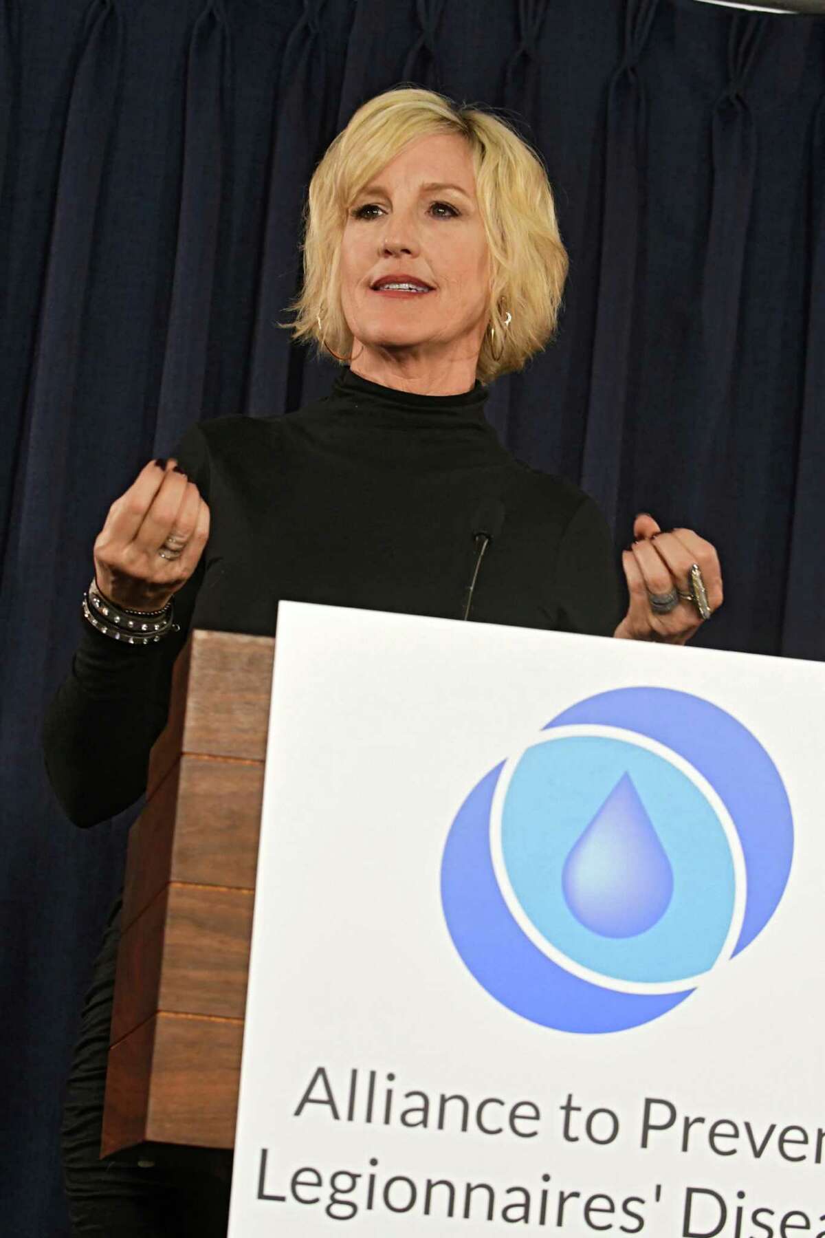 Public health and environmental advocate Erin Brockovich joins the Alliance to Prevent Legionnaires' Disease and the Allergy and Asthma Network as they hold a press conference at the Legislative Office Building on Tuesday, Jan. 24, 2017 in Albany, N.Y. The advocates are calingl on lawmakers and health officials to work towards real, effective solutions to New York's escalating Legionella and Legionnaires' disease crises. (Lori Van Buren / Times Union)