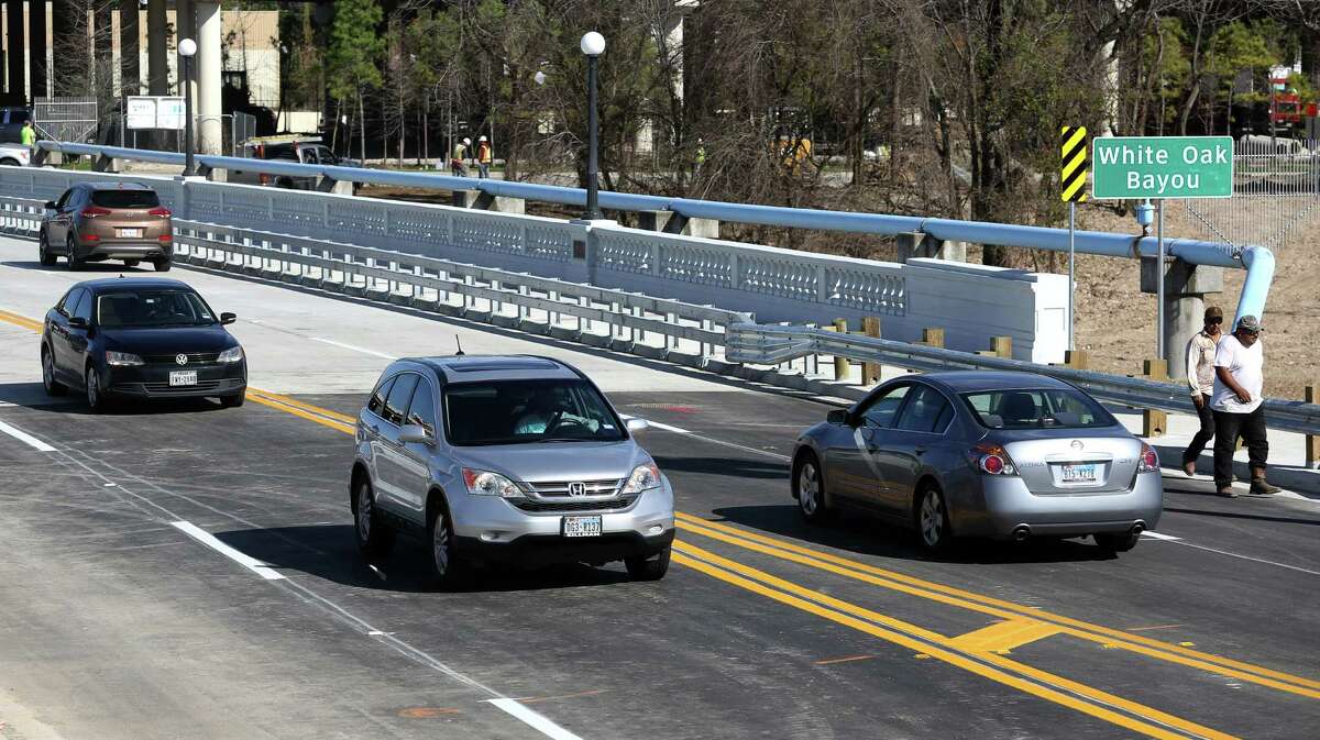 Traffic drive on the newly-opened Yale Street bridge on Jan. 24. The bridge, which was closed for reconstruction in April 2016, was re-opened on Monday evening.