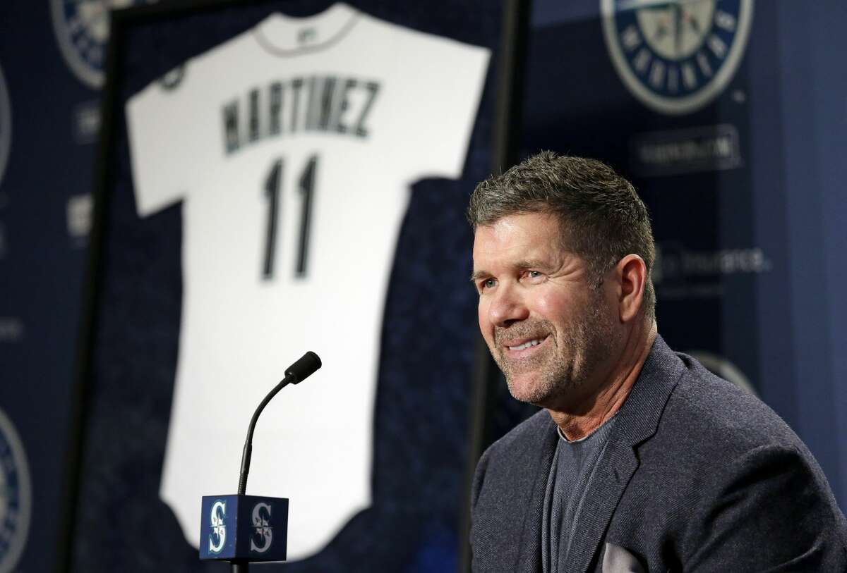 Former Mariners designated hitter Edgar Martinez smiles as he speaks at a news conference announcing the retirement by the team of his jersey number 11, Tuesday, Jan. 24, 2017, in Seattle. The Mariners will retire Martinez's number Saturday.