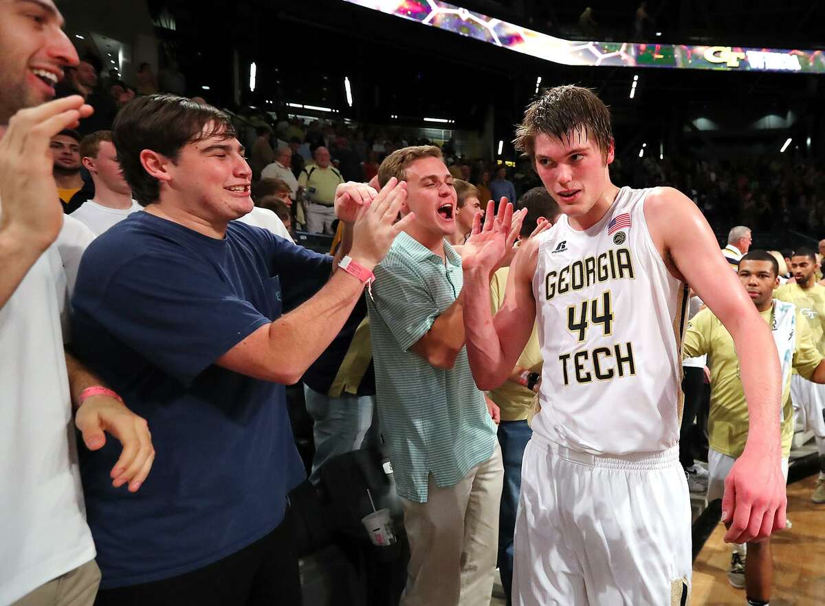 Georgia Tech’s Ben Lammers (44) celebrates with fans after a 75-63 victory against Clemson on Jan. 12, 2017, at McCamish Pavilion in Atlanta.