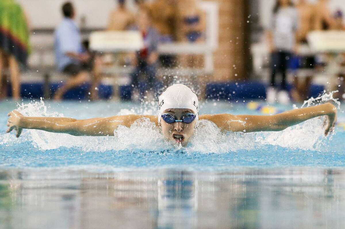 TMI’s Elizabeth Holmes swims the breaststroke leg of the girls 200-yard IM during the TAPPS Central Regional Championships at Davis Natatorium on Jan. 25, 2017. Holmes took first place in Division 2 with a time of 2:11.07.