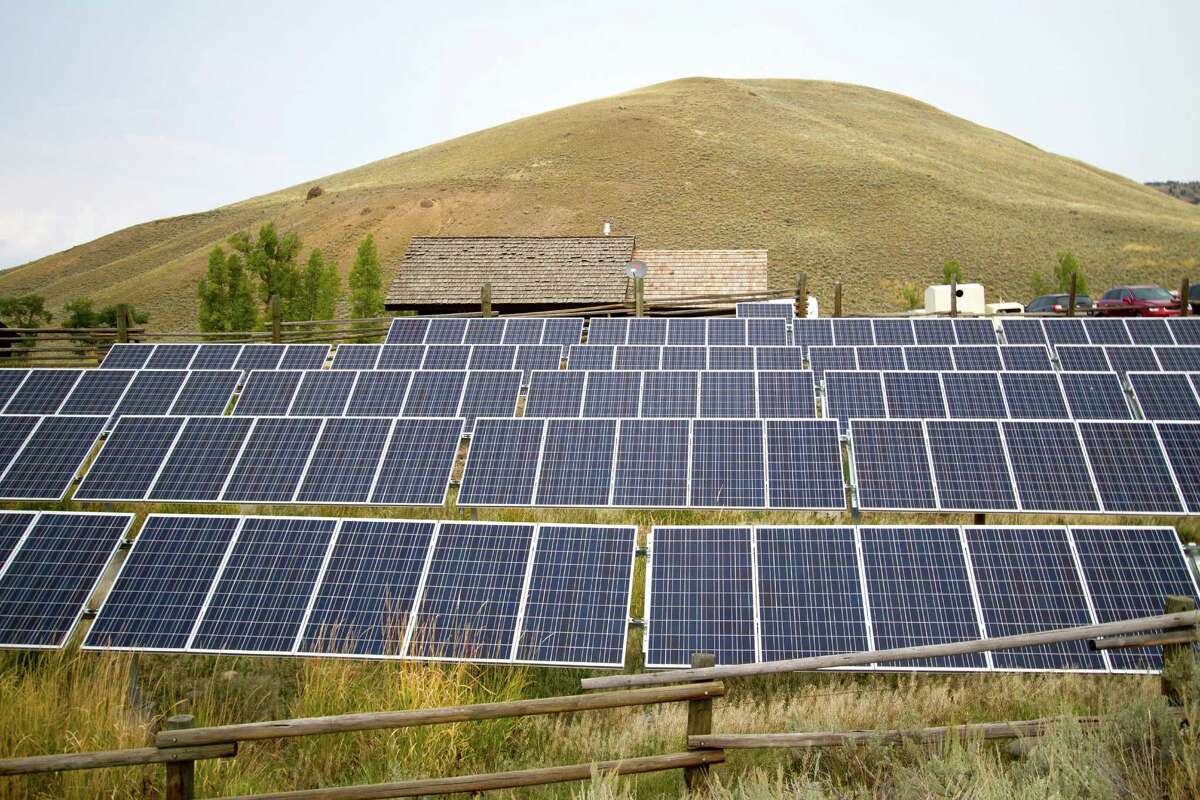 This Aug. 27, 2015, file photo shows a solar power array at the Lamar Buffalo Ranch in Yellowstone National Park, Wyo. In recent years, huge solar and wind farms have sprouted up on public desert land in the Western United States through generous federal tax credits. Click through the gallery to see one of the world's largest solar power plants: