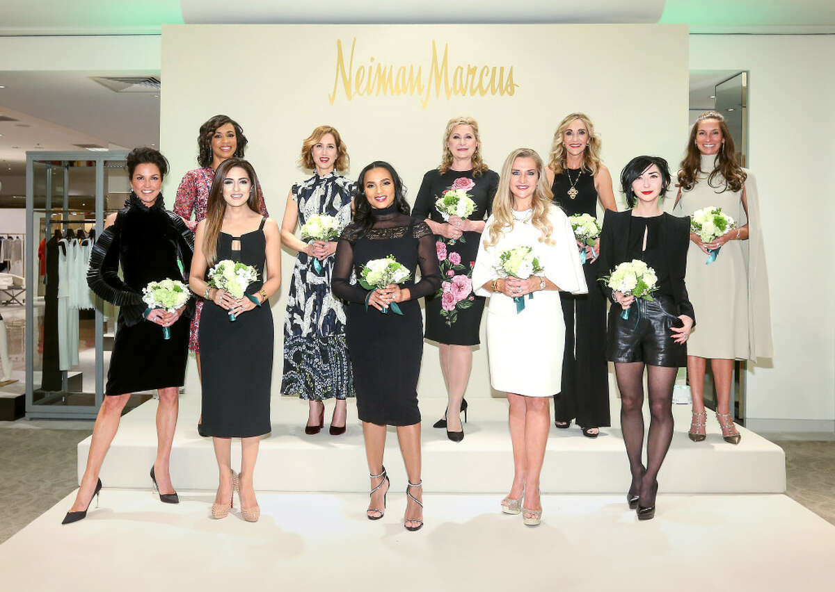 Houston Chronicle's Best Dressed honorees, rear from left, Gina Gaston Elie, Carolyn Dorros, Carol Linn, Jana Arnoldy and Lisa Holthouse, and from from left, Jessica Rossman, Sneha Merchant, Clerenda McGrady, Mary D'Andrea and Carrie Brandsberg-Dahl pose for a photo at the Best Dressed Announcement Party at Neiman Marcus in the Galleria, Wednesday, Jan. 25, 2017, in Houston. ( Jon Shapley / Houston Chronicle)