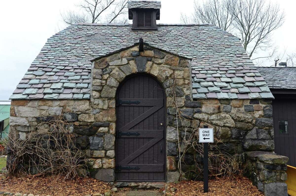 The former Rock Ledge Estate Tuesday, january 24, 2017, in Rowayton which is no longer a private residence but whose main house is now home to hedge fund Graham Capital, and the etsate's two former outbuildings now house the Rowayton Community Center and Rowayton Public Library in Norwalk, Conn.