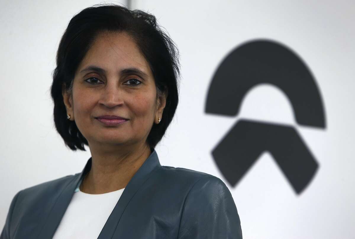 Padmasree Warrior, the CEO of the U.S. operations of NIO, is seen with the company's new corporate logo in San Jose, Calif. on Wednesday, Jan. 25, 2017. China-based NIO, which until recently was known as NextEV, is developing autonomous electric vehicles.