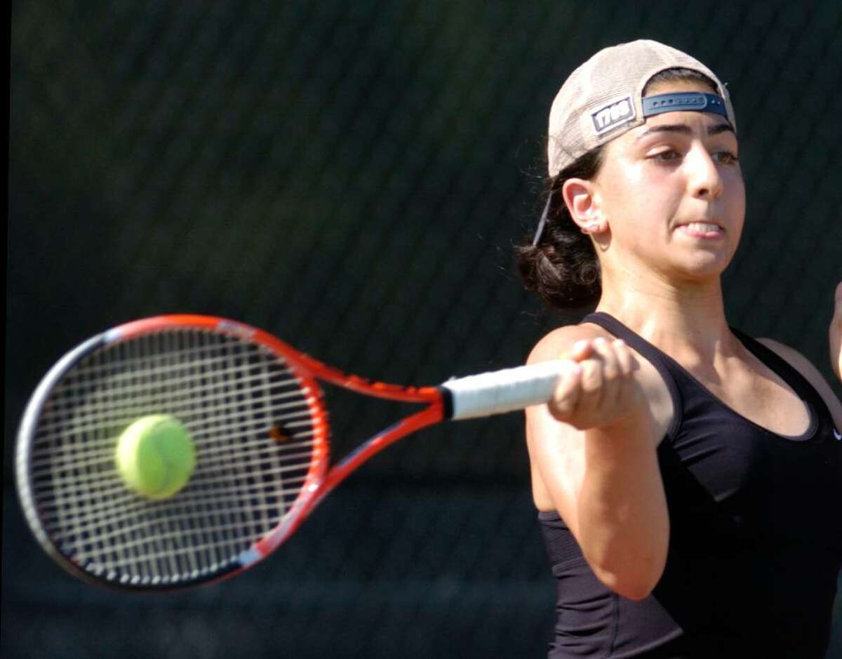 Tina Tehrani of the New Canaan High School girls tennis team during her FCIAC Championship match against Jen DeLuca of Greenwich High School, at Wilton High School, Tuesday, May 26, 2010. Tehrani defeated Deluca 6-0, 6-0, and New Canaan defeated GHS, 5-2 to take the championship.