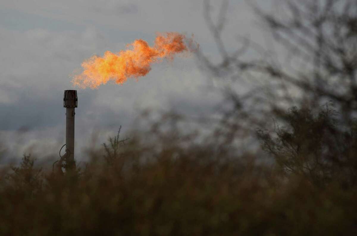 A gas flare burns at Ritchie Farms, an oil lease in La Salle and Dimmit counties, operated by EP Energy E&P Company, L.P. on Thursday, Dec. 11, 2014. The oil drilling operation has burned more than 800 million cubic feet of gas in the first seven month of 2014 which is about a fifth of the total gas production at the lease. Ritchie Farms is one of the top sources of flaring in the Eagle Ford according to data obtained from the Texas Railroad Commission. (Kin Man Hui/San Antonio Express-News)