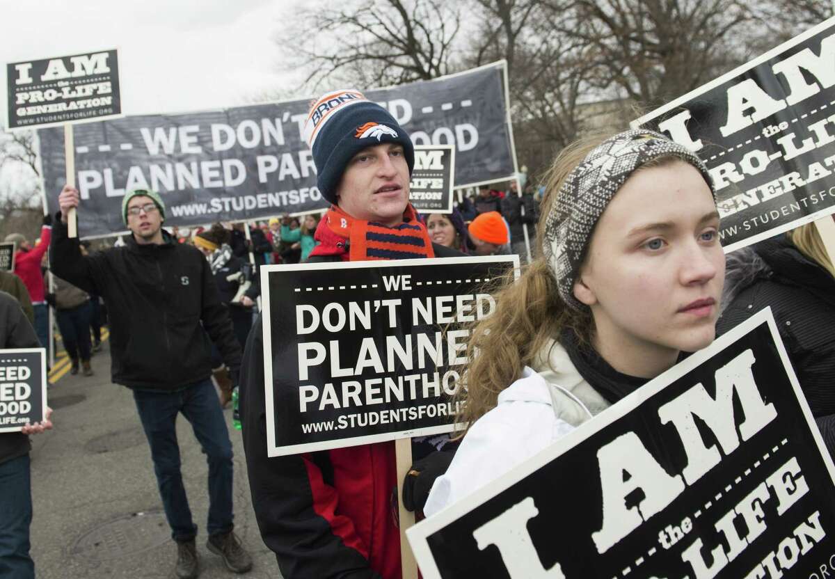 Pro-life demonstrators march towards the US Supreme Court during the 44th annual March for Life in Washington, DC, on January 27, 2017. Anti-abortion advocates descended on the US capital on Friday for an annual march expected to draw the largest crowd in years, with the White House spotlighting the cause and throwing its weight behind the campaign. / AFP PHOTO / SAUL LOEBSAUL LOEB/AFP/Getty Images ORG XMIT: Annual Ma