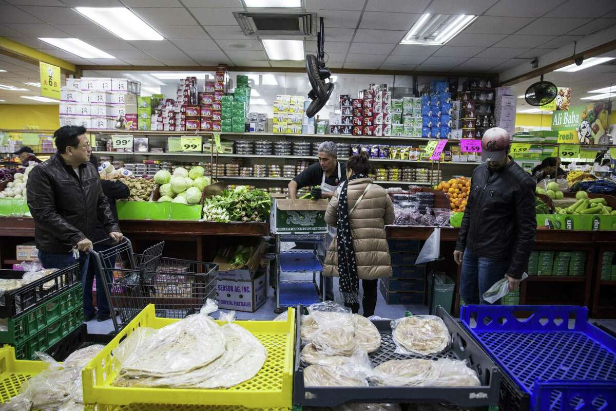 People shop at Ali Baba International Food Market in San Antonio, Texas on January 27, 2017.