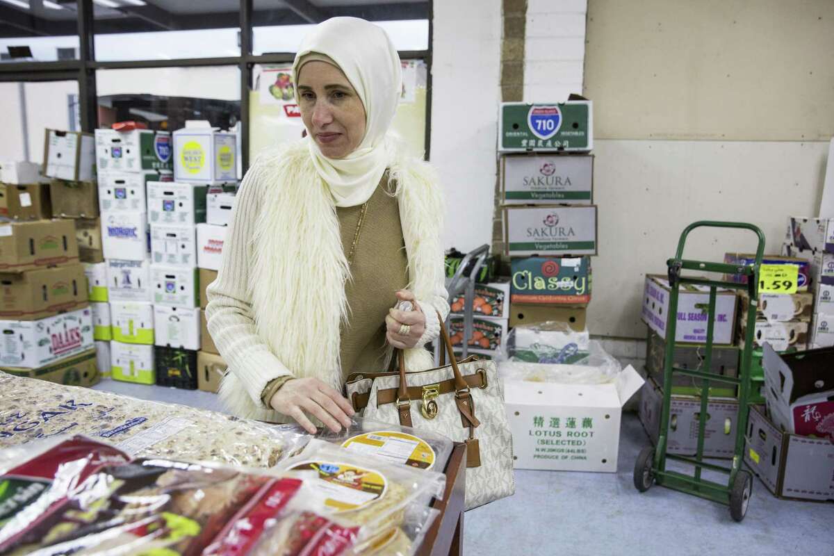 Aziza Taha shops at the Ali Baba International Food Market in San Antonio, Texas on January 27, 2017. She and her husband come up once a month from Laredo, because they say there is not anything like this market there.