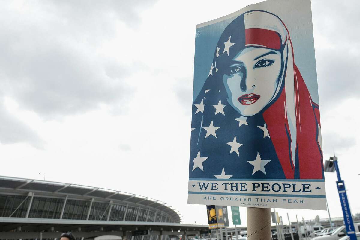 NEW YORK, NY - JANUARY 28: Protestors rally during a protest against the Muslim immigration ban at John F. Kennedy International Airport on January 28, 2017 in New York City. President Trump singed the controversial executive order that halted refugees and residents from predominantly Muslim countries from entering the United States. (Photo by Stephanie Keith/Getty Images)