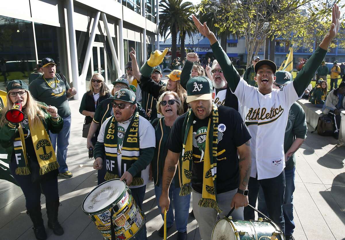 The Right Field Bleacher Die Hards drum up excitement for the Oakland A's at the team's annual FanFest celebration on Jack London Square in Oakland, Calif. on Saturday, Jan. 28, 2017.