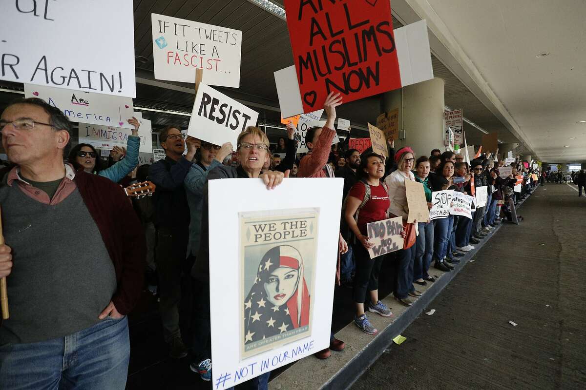 Protestors block arrival lower deck roadway on Saturday, Jan. 28, 2017 in San Francisco, Calif.