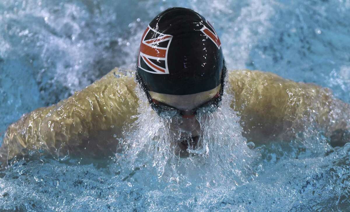 Samuel Willstrop of Churchill High School swims to victory in the 100 breaststroke at the District 26-6A swimming meet at the Davis Natatorium on on Jan. 28, 2017.