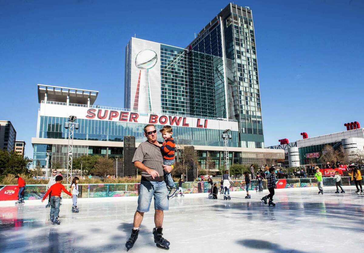Skaters hit the ice at Discovery Green downtown during the lead-up to Super Bowl LI in Houston.