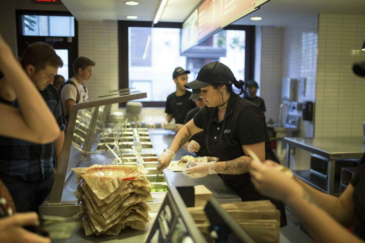 Chipotle Mexican Grill Inc., which is trying to hire about 600 “crew members” for its U.S. restaurants, is considering raising prices in some parts of the country in order to pay more. It’s already paying an average $10 an hour.