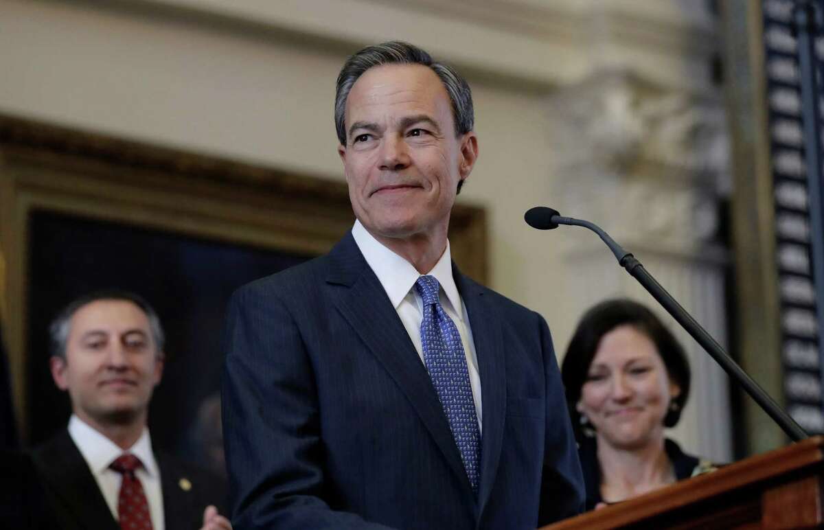 FILE - In this Jan. 10, 2017, file photo, Texas Speaker of the House Joe Straus, R-San Antonio, stands before the opening of the 85th Texas Legislative session in the House chambers at the Texas State Capitol after he was re-elected for a fifth consecutive term in Austin, Texas. 