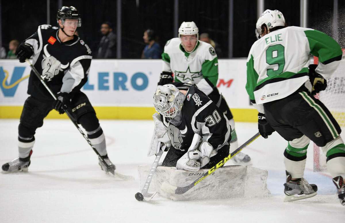 Rampage goaltender Spencer Martin stops a shot by Texas Stars left winger Remi Elie (9) during the first period of an AHL game on Dec. 27, 2016, in San Antonio.