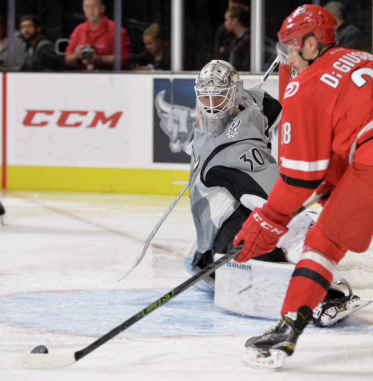 Rampage goaltender Spencer Martin (30) watches the puck during the first period of an AHL game against the Charlotte Checkers on Nov. 18, 2016, in San Antonio.