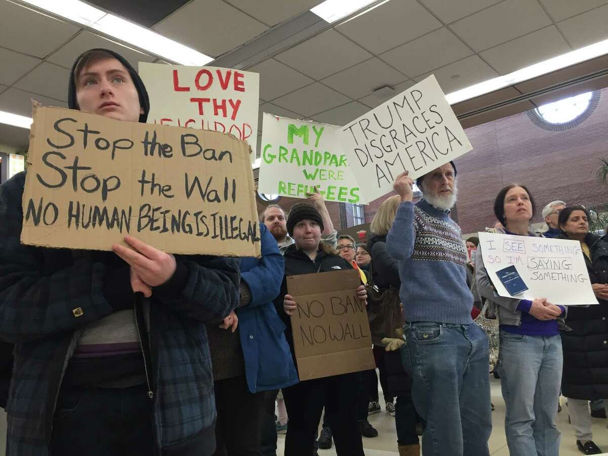 Protestors gather at Albany International Airport Sunday, Jan. 29, 2017 to speak out against the White House's executive order to bar refugees from some Muslim-majority nations from entering the U.S. (Amanda Fries/ Times Union)