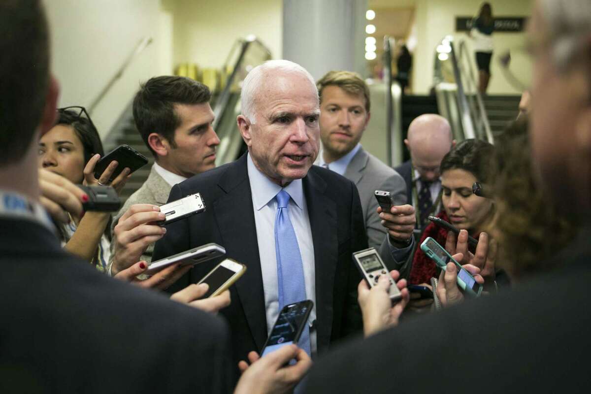 FILE -- Sen. John McCain (R-Ariz.) talks to reporters after leaving the Senate floor, on Capitol Hill in Washington, Jan. 5, 2017. Trump's executive order halting entry to the U.S. of Syrian refugees and all travelers from several predominantly Muslim countries drew criticism from several prominent Republican senators, including Sens. Lindsey Graham of South Carolina, Rob Portman of Ohio and McCain. (Al Drago/The New York Times)