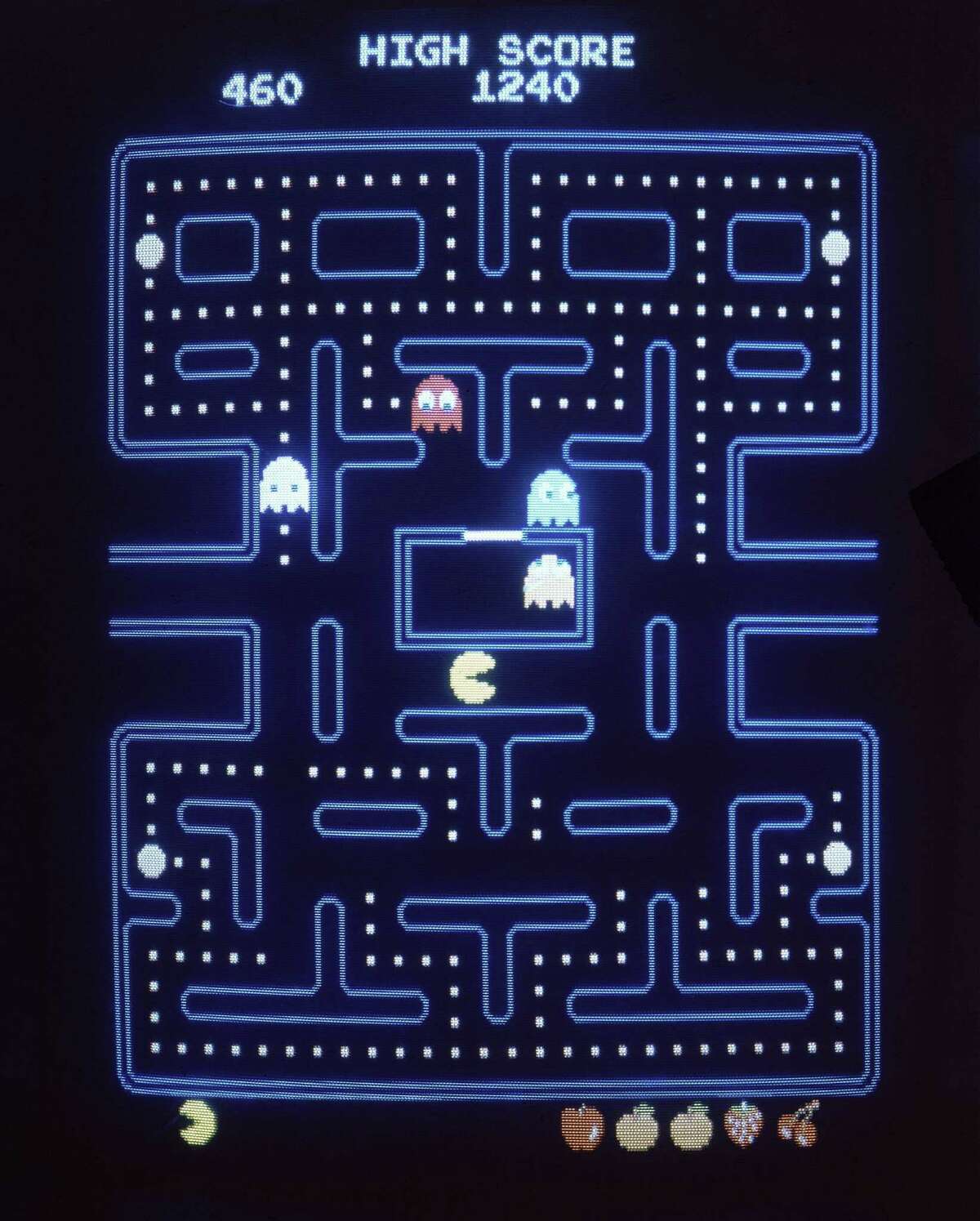 This close-up view of a monitor shows the electronic video game “Pac-Man.” Masaya Nakamura, the “Father of Pac-Man” who founded the Japanese video game company behind the hit creature-gobbling game, has died. He was 91.