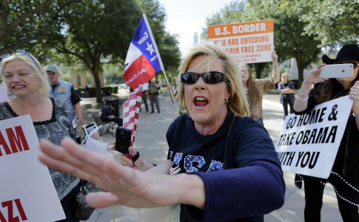 Hecklers yell to disrupt the annual Texas Muslim Capitol Day gathering in Austin in 2015.