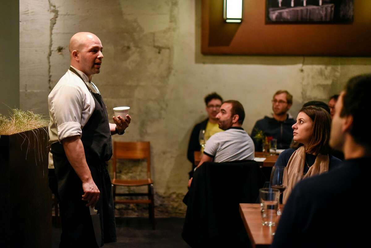 Chef Sayat Ozyilmaz talk to guests about what he and his wife, chef Laura Ozyilmaz, will be serving during their pop-up restaurant "Istanbul Modern" in San Francisco, CA on Sunday, January 29, 2017.