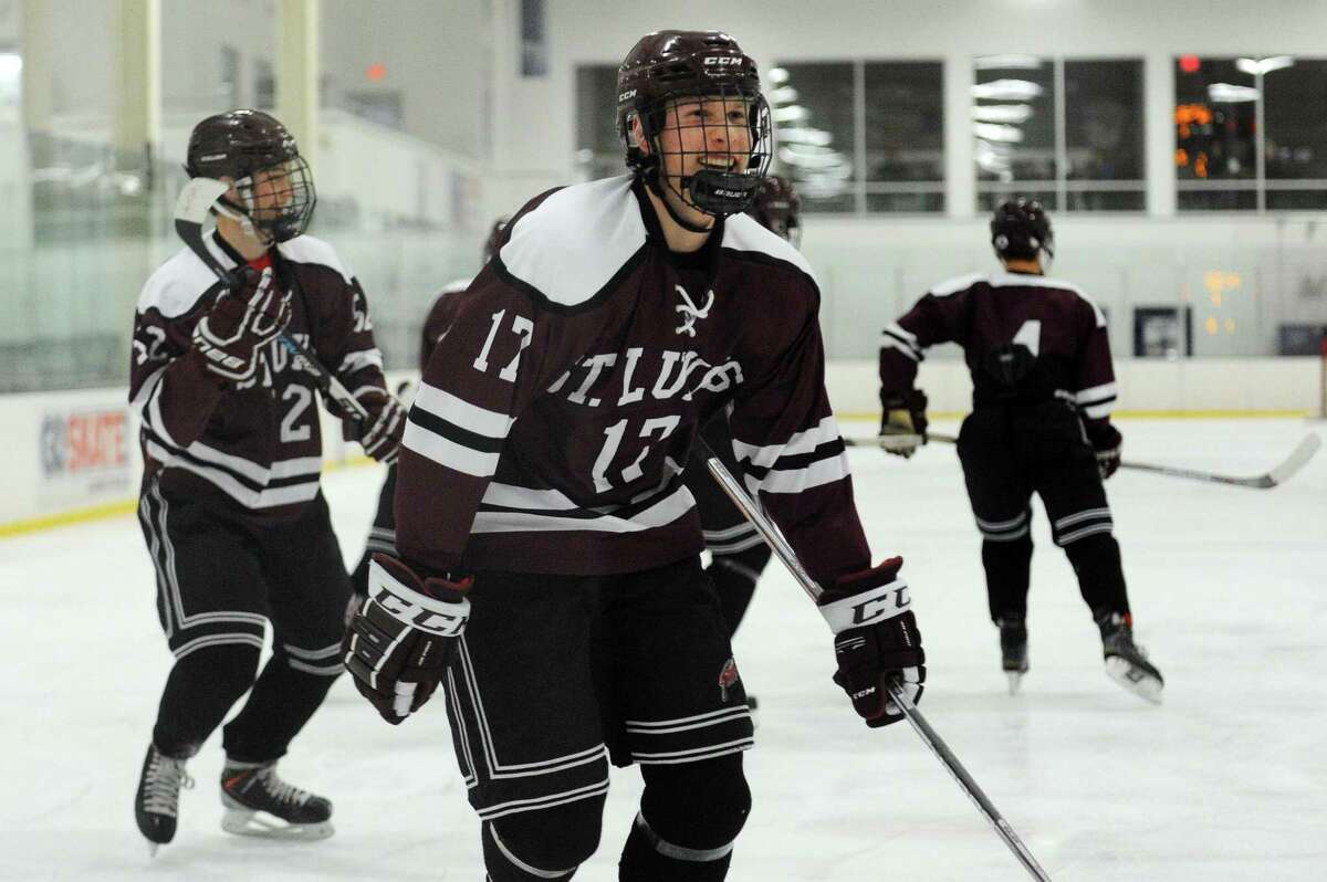 St. Luke's Will Frossell smiles after scoring a goal against King School during the boys varsity hockey game at the SoNo Ice House in Norwalk, Conn. on Monday, Jan. 30, 2017.
