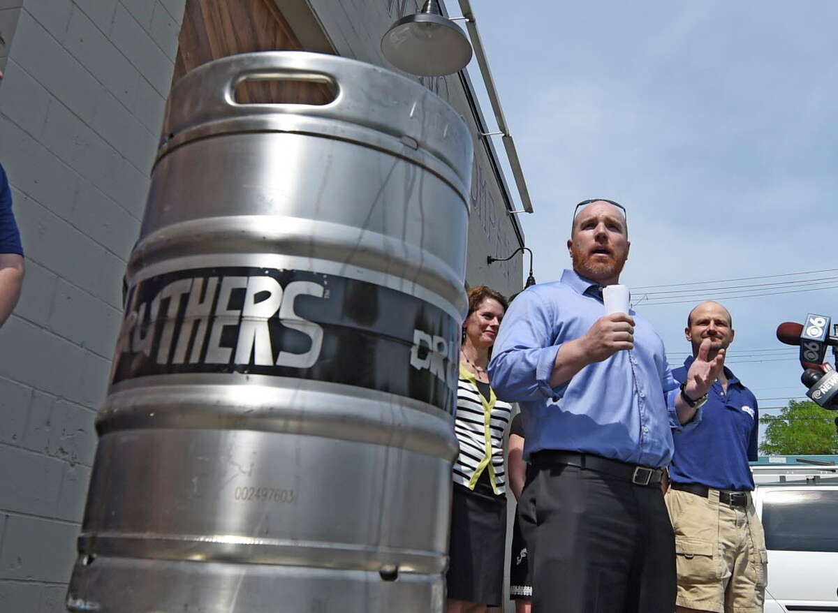 Chris Martell, owner Druthers Brewing Company, speaks during the opening for Druthers Brewing Company's new establishment on Broadway Tuesday, May 26, 2015, in Albany, N.Y. This their third location in the region. (Skip Dickstein/Times Union)