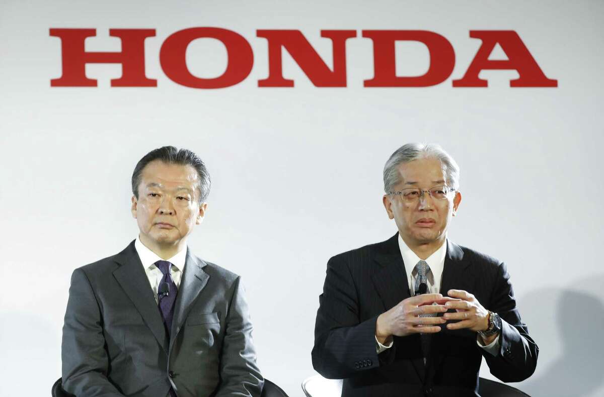 Toshiaki Mikoshiba, left, chief operating officer of the North American Region for Honda Motor Co., Ltd. and president of Honda North America, Inc. and Takashi Moriya, right, Senior Chief Engineer, Honda Research and Development, talk about the GM-Honda Next Generation Fuel Cell in Detroit, Monday, Jan. 30, 2017. General Motors Co. and Honda Motor Co. took a big step toward putting out vehicles powered by hydrogen fuel cells by forming a joint venture to produce the systems for both companies' vehicles. Executives say the use of fuel cell systems may not be limited to cars. They said that they're exploring military, aerospace and even residential uses for the systems, which generate electricity to power vehicles. (AP Photo/Paul Sancya)
