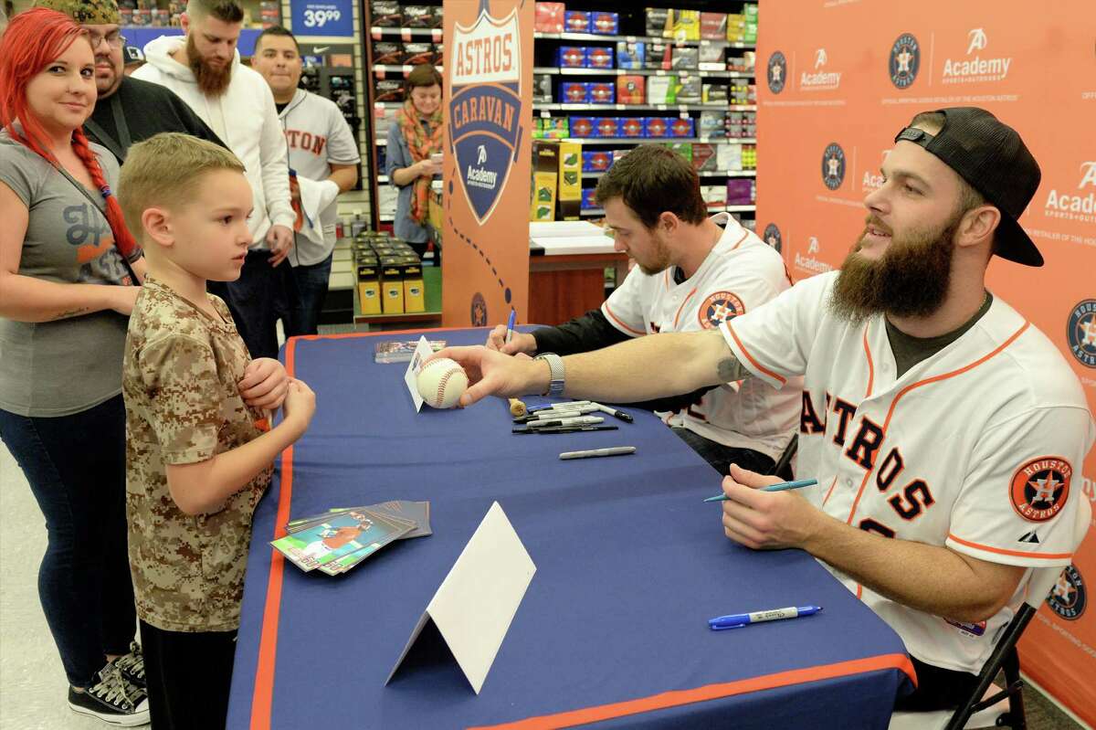 Houston Astros players shop with kids at Academy during Astros-Caravan stop