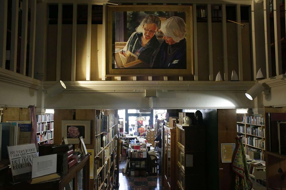 A painting of owner Faith Bell and her mother Valeria Bell, by Faith Bell's sister in law, hangs at Bell's Books on Tuesday, January 31, 2017 in Palo Alto, Calif.