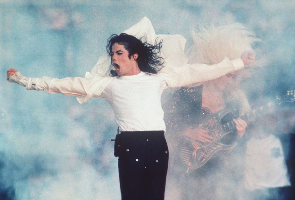 FILE--Michael Jackson performs at Super Bowl XVII in Pasadena on Feb. 1, 1993. At age 30, the Super Bowl turns a significant milestone this year, firmly entrenched in the national psyche, an event so enormous that the country seems to stop at the end of each January to watch this slice of Americana take place. (AP Photo/file)