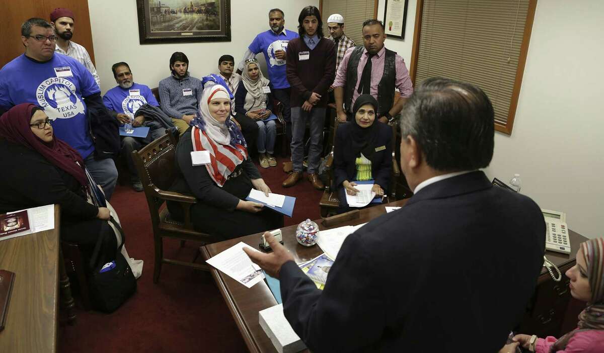 A group of Muslim men and women, including Sarwat Husain, right, president of the Council on American-Islamic Relations San Antonio, meet with State Representative Tomas Uresti of District 118 during Texas Muslim Capitol Day, in Austin, Texas on Tuesday, Jan. 31, 2017.