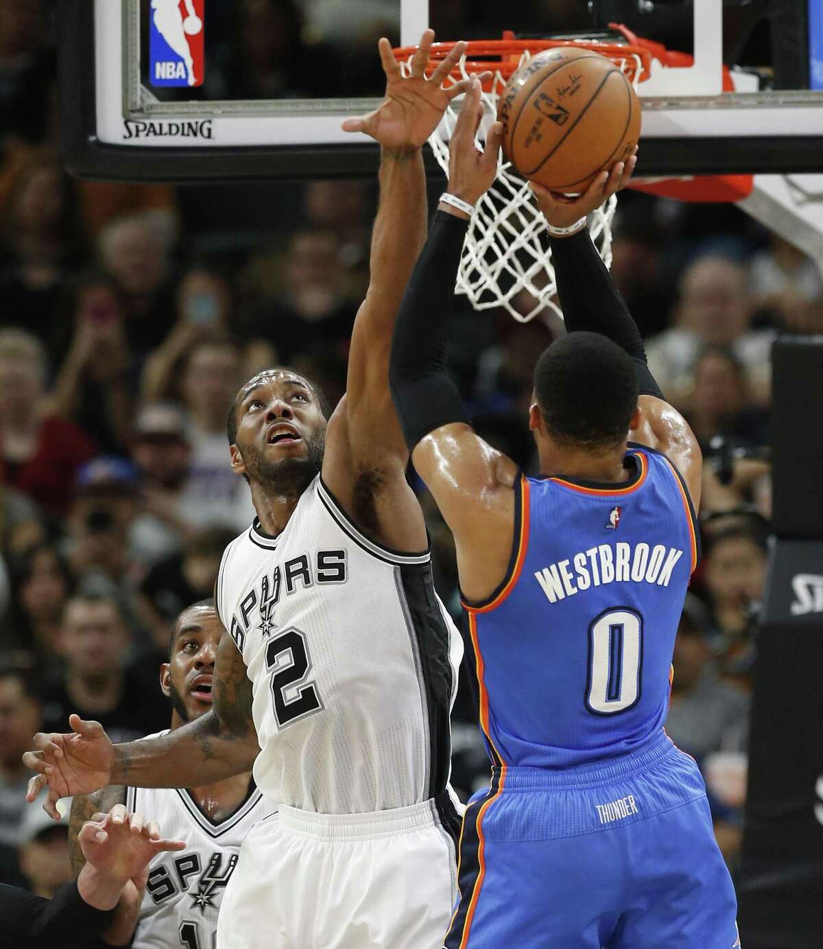 Spurs’ Kawhi Leonard (2) defends against the Oklahoma City Thunder’s Russell Westbrook (0) at the AT&T Center on Jan. 31, 2017.