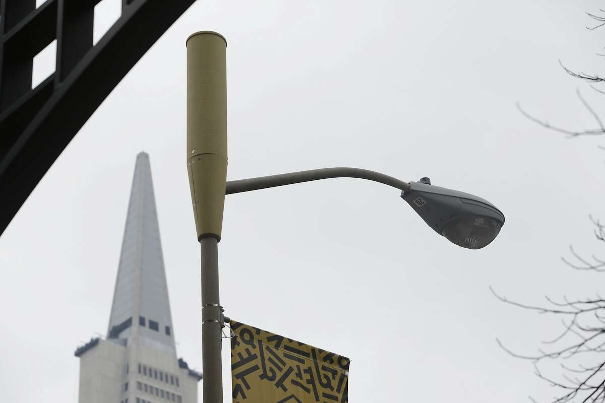 An antenna enclosure for a small cell is seen on top of a light pole on Wednesday, February 2, 2017 in San Francisco, Calif.