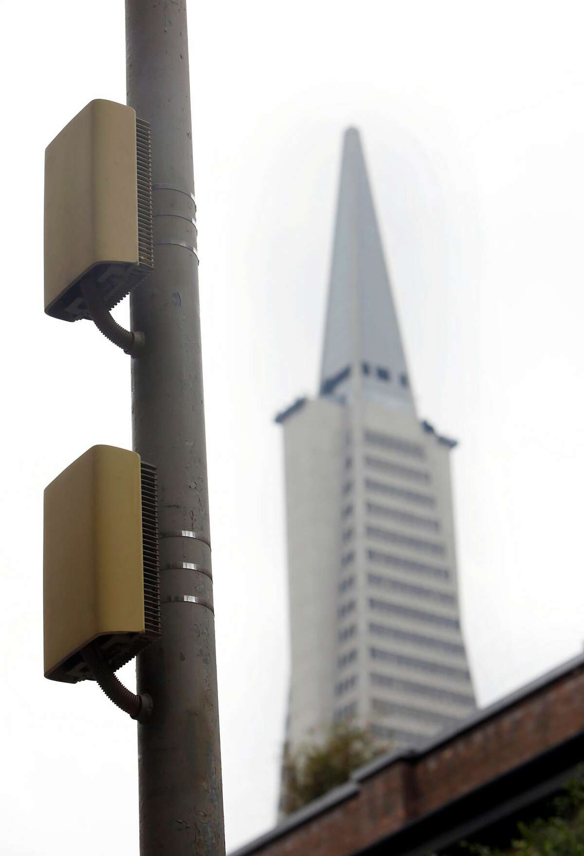 The power amplifier for a small cell is seen on a light pole on Wednesday, February 2, 2017 in San Francisco, Calif.