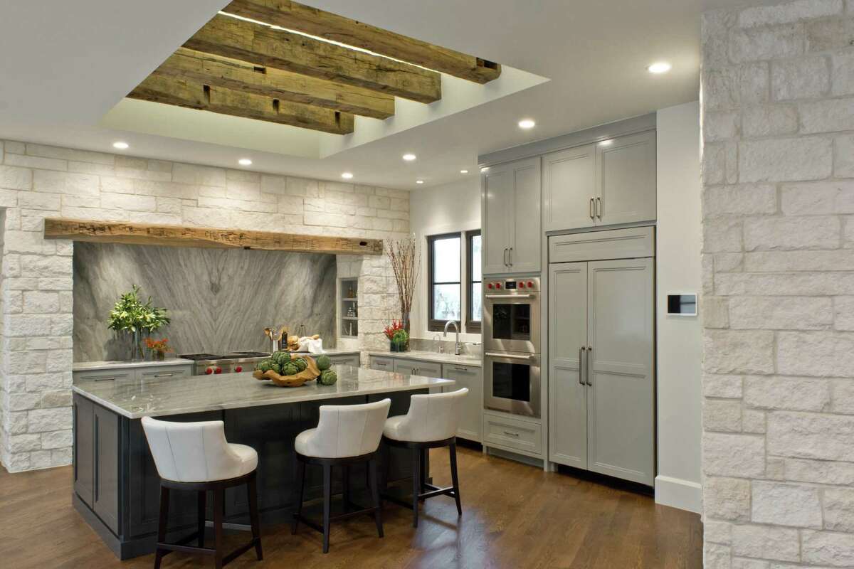 BRADSHAW: A kitchen remodel with repurposed wooden beams in Shavano Park by Julie Bradshaw.