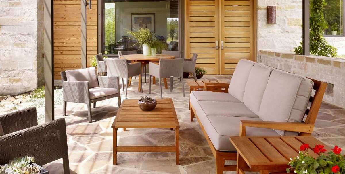 BAXTER: Debbie Baxter brought the indoors outside at the LEED Platinum house with simple wood furniture.