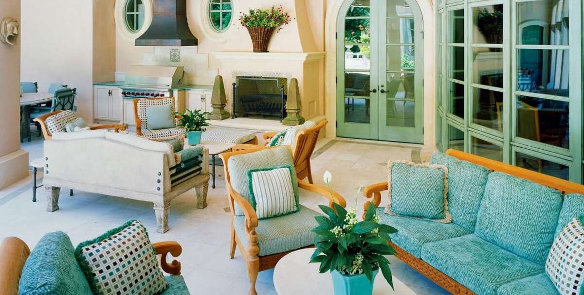 BAXTER: Debbie Baxter designed this living room with Palm Beach colors in a Mediterranean style home.