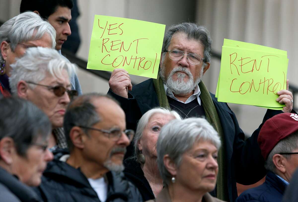 Juan Reardon and other tenants rights advocates protest in front of the Contra Costa County Courthouse before a hearing is held in Martinez, Calif. on Wednesday, Feb. 1, 2017. Richmond voters approved a rent control measure in November but a group of property owners is seeking an injunction to stop its implementation.