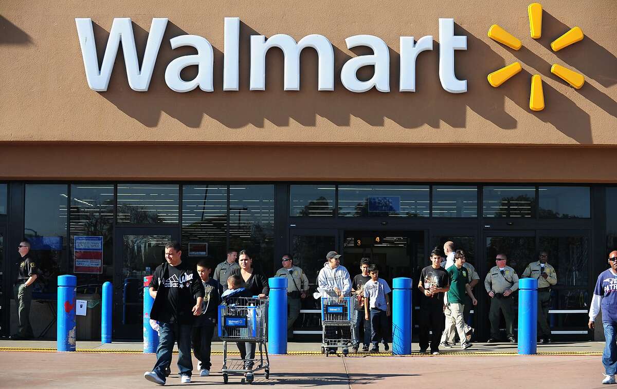 (FILES) This file photo taken on November 23, 2012 shows shoppers at a Walmart store in Paramount, California. The US retail giant Wal-Mart announced January 17, 2017 it wants to create 10,000 jobs in the United States in 2017, a few days before the inauguration of Donald Trump, who has been pressing companies to expand their business on US soil. / AFP PHOTO / FREDERIC J. BROWNFREDERIC J. BROWN/AFP/Getty Images