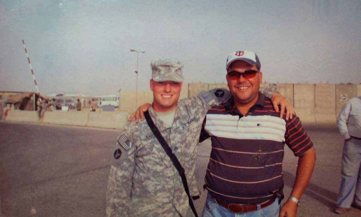 Photograph of Haitham Alkhfe next to a U.S Army soldier in Iraq. Alkhfe brought his wife and son to Houston from their home in Iraq where worked for an American oil company and as a translator for the U.S. Army. Alkhfe who has a green card, says he was financially successful, but his family was not safe in Iraq. ( Photo provided by Haitham Alkhfe )