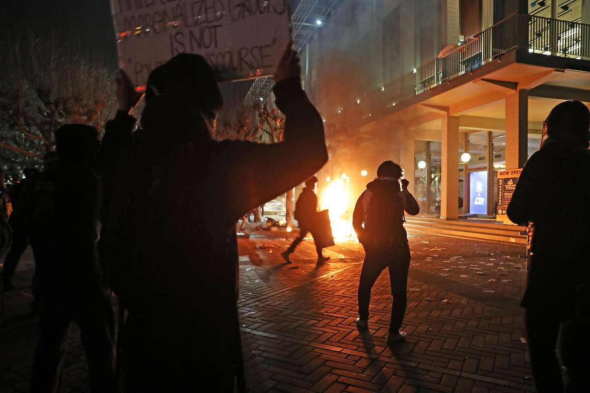 Demonstrators force the cancellation of talk by right-wing provocateur Milo Yiannopoulos in Berkeley, Calif., on Wednesday, February 1, 2017.