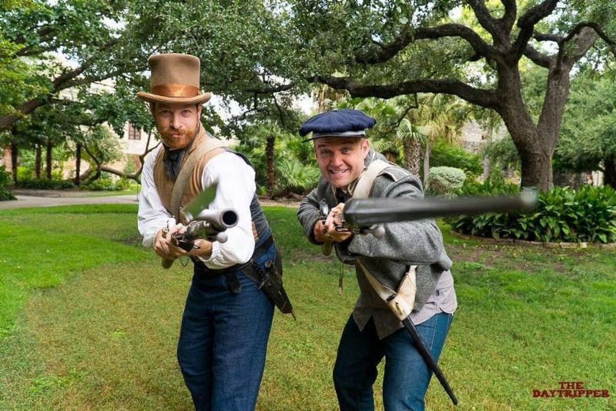 Chet Garner (right), host of Texas travel show "The Daytripper," had fun re-enacting history with the Alamo's Living History coordinator Ryan Badger, who frequently plays Davy Crockett and Jim Bowie in exhibitions. The playful Garner will be on hand at an Alamo-set premiere party.