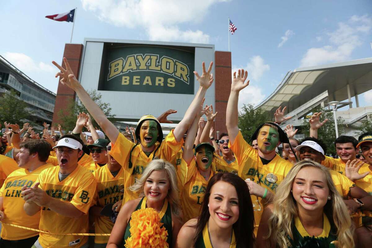 Baylor fans cheer outside the stadium before an NCAA college football game against Northwestern State Friday, Sept. 2, 2016, in Waco, Texas. (AP Photo/LM Otero)